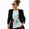 Female model in a white sweatshirt with colourful abstract print complemented with a black blazer for a casual look.