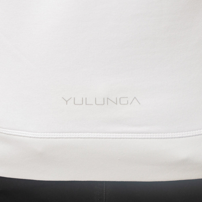 A close up to the back of a white sweatshirt with Yulunga brand logo print in grey