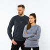 A male and a female wearing grey sweatshirts made of organic cotton with a Yulunga brand embroidery also in grey.