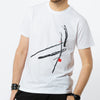 A male wearing a unisex white t-shirt with an abstract Japanese style graphic in black, grey and red.