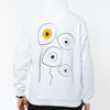 White organic cotton hoodie with a large abstract graphic on the back representing eyes  in black and white colour and one yellow eye between them. This hooded sweatshirt is by eco-friendly brand Yulunga.